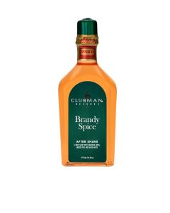 A 6 ounce bottle of Clubman Reserve Brandy Spice After Shave Lotion featuring its brandy-colored liquid contents