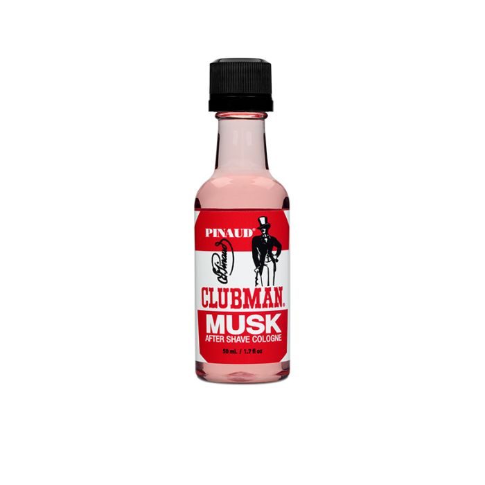 A clear 1.7-ounce bottle of Clubman Pinaud After Shave Cologne Musk showing its rose-tinted liquid contents